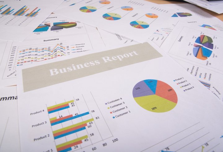 Business report. Graphs and charts. How to read, understand, and improve your Business credit score like a pro and pile of documents. Business concept.